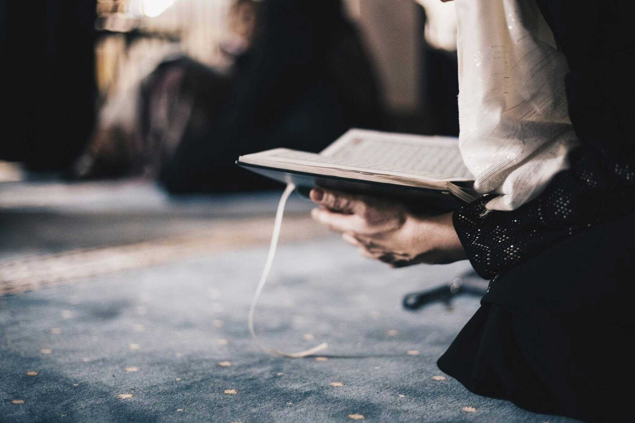 Woman reading Quran